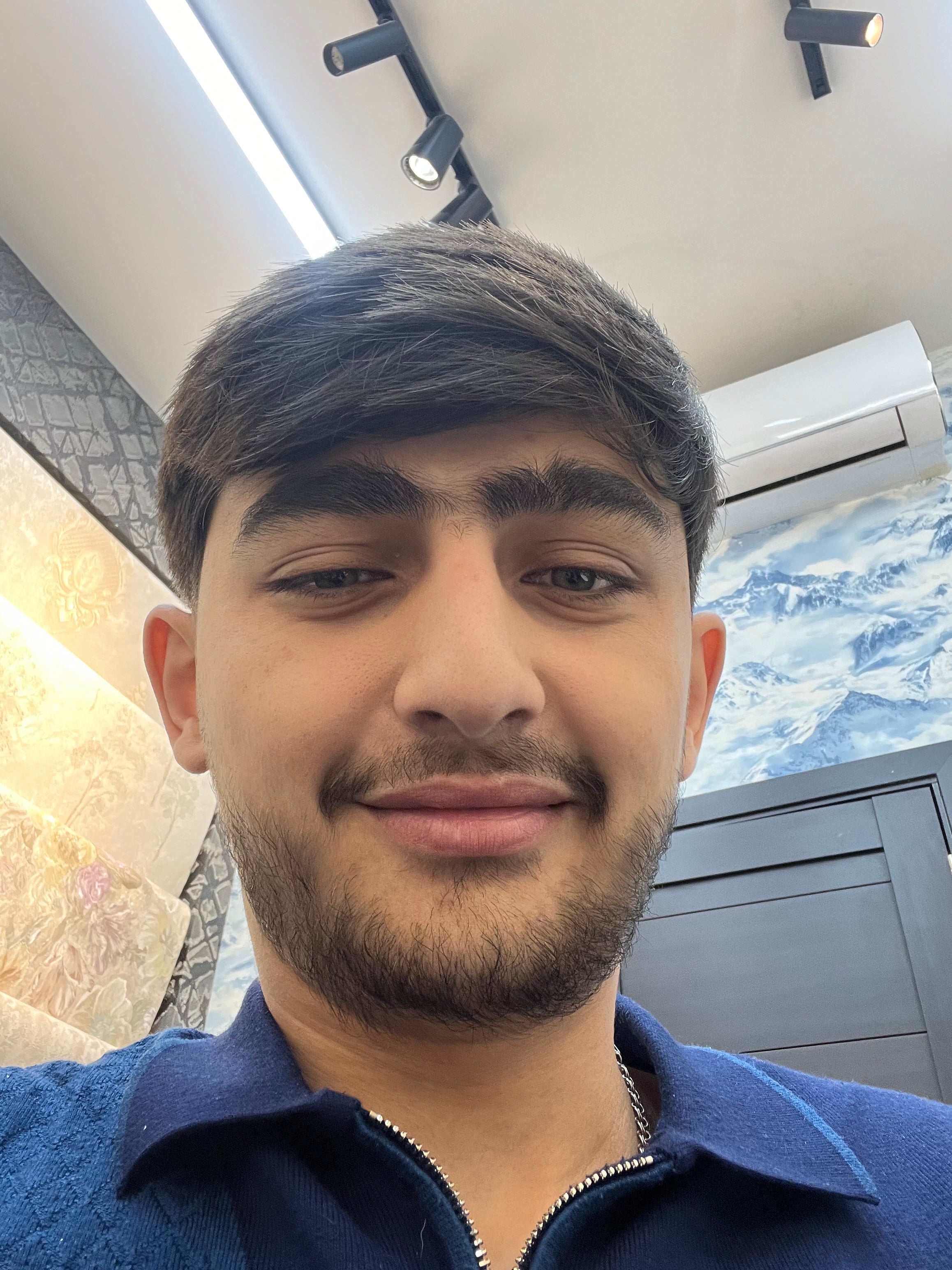 Ali K.